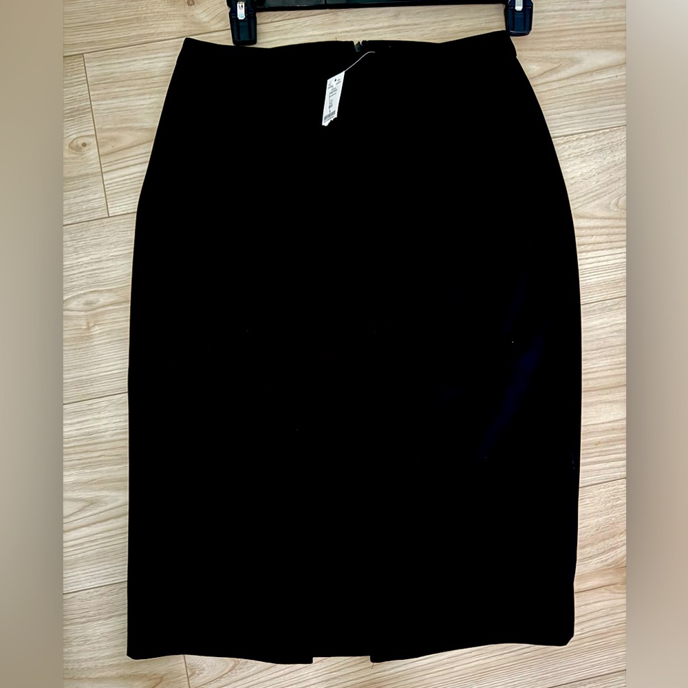 White House Black Market crepe skirt with front split. Size 6.